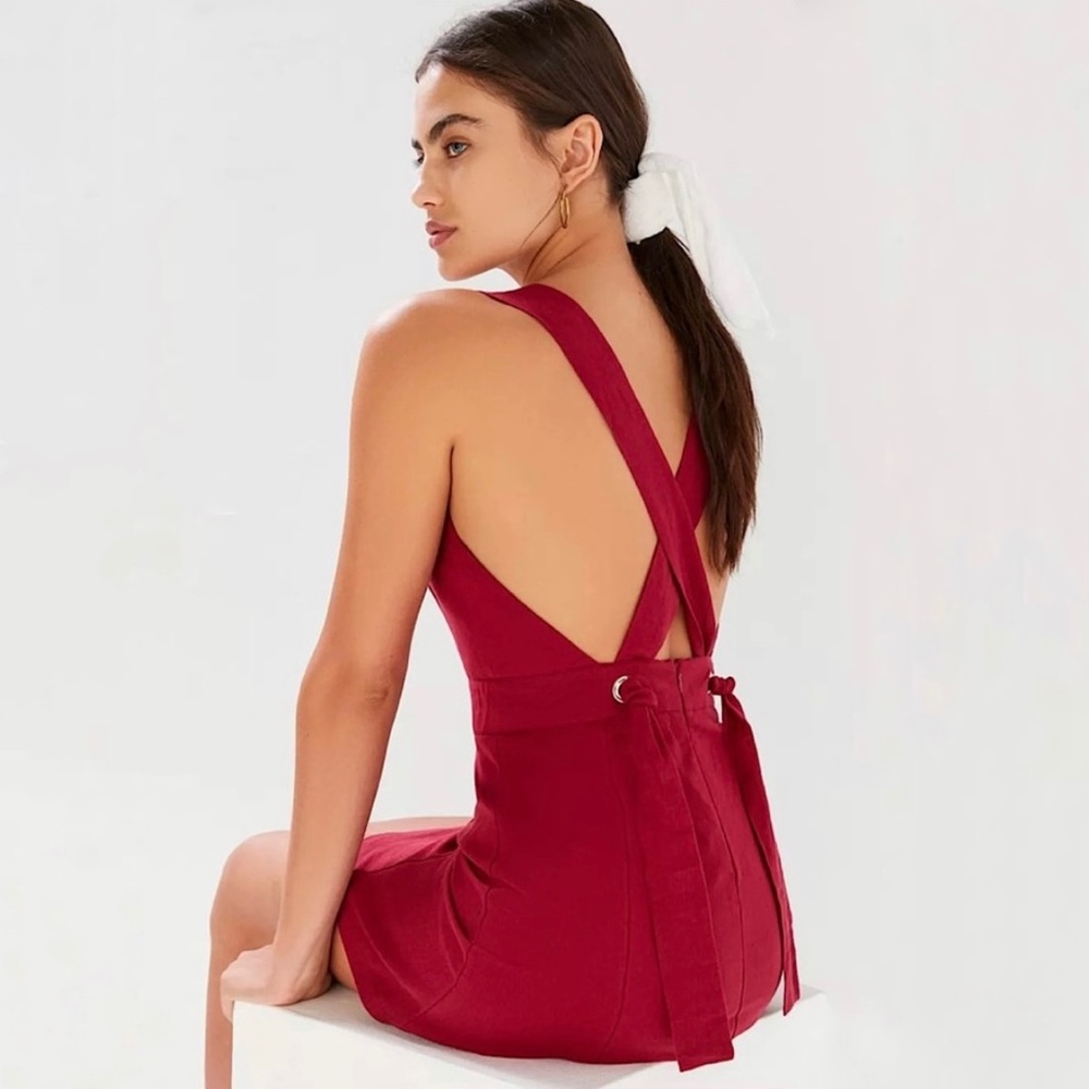 Lynn linen cross back apron dress from Urban Outfitters